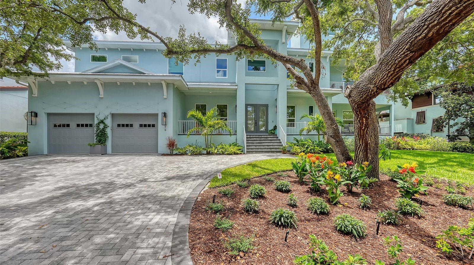 Modern Key West Luxury on Sarasota Bay – Custom Maglich Home in Exclusive Gated Community. Welcome to Tocobaga Bay, an ultra-exclusive, gated enclave of just nine custom homes nestled directly on Sarasota Bay. This stunning 2023 Maglich Homes build offers the perfect blend of coastal elegance and cutting-edge design in one of Sarasota’s most coveted waterfront communities. Spanning over 5,600 square feet under air, this modern Key West-style home is designed to impress at every turn. Step inside to soaring 10-foot ceilings, wood-look tile flooring throughout, and a modern open floor plan built for both entertaining and everyday luxury. The heart of the home features a designer chef’s kitchen, a spacious walk-in pantry, and high-end Thermador appliances, including a gas range w/ steamer oven, and a built-in espresso machine. A striking double-sided fireplace anchors the expansive living and dining areas. This home offers five spacious bedrooms with 4 full and 2 half bathrooms, including a private ground-floor mother-in-law suite—ideal for guests or multigenerational living—and a massive upstairs primary suite with serene bay views from a private balcony. Each additional bedroom is generously sized with ample natural light and privacy. Need a home office? There’s a dedicated private workspace, plus a third-floor bonus area with a rooftop deck ready to be turned into the perfect retreat for sunset gatherings. The home is also elevator shaft-ready for future convenience. Enjoy Florida living year-round with a custom-designed pool and spa, and a giant 2-car garage with a 3rd garage door for golf cart access. Tocobaga Bay combines privacy, luxury, and location—all just minutes from downtown Sarasota, award-winning beaches, top-rated schools, and The Bay Park just a safe short walk from your house (a $300 million dollar waterfront public park project). This is a one-of-a-kind opportunity that needs to be felt in person to grasp. Schedule your private showing today.