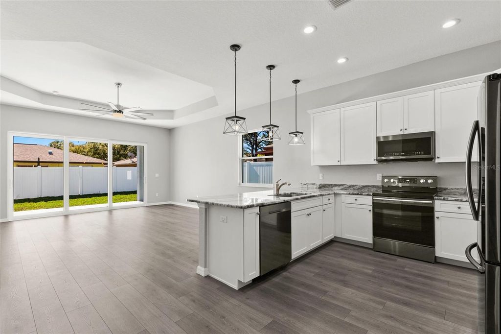 Photo of 1522 Haverhill Drive, New Port Richey, FL 34655 (MLS # TB8490429)