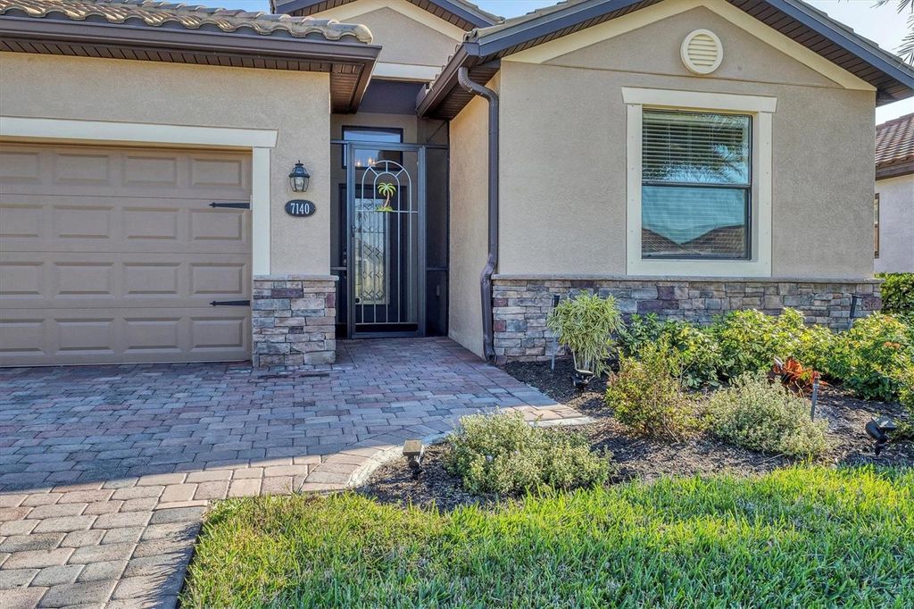 Photo of 7140 Marsh View Terrace, Bradenton, FL 34212 (MLS # A4654916)