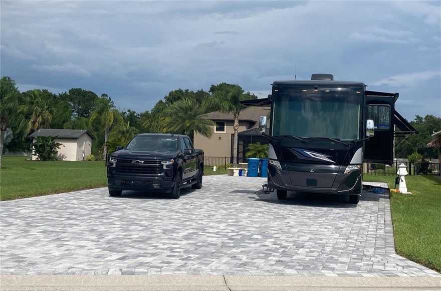 This beautiful lot with pad is ready to go! Located in the sought after community of Mt Olive Shores North, a 55+ Upscale motorhome community.  This lot has beautifully colored neutral pavers with plenty of space to put your RV and several vehicles.  The lot is oversized and has already been situated on the property for a home to be build if you choose.  The plans for the house are also available if you need them. 
 If you are looking for a pad for now and build later than this is the one.  
The community boasts two clubhouses, pickleball courts, pools, dog park and plenty of activities to keep you as busy as you want.
Call for an appointment today!