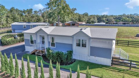 Tiny photo for 521 NW 80th Avenue, Ocala, FL 34480 (MLS # OM714237)