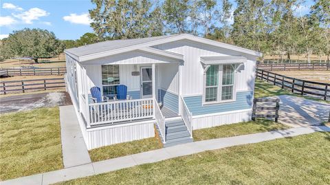 Tiny photo for 521 NW 80th Avenue, Ocala, FL 34480 (MLS # OM714237)