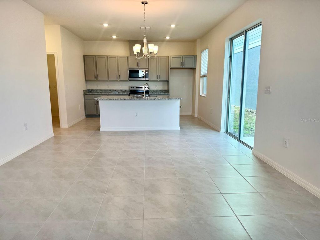 Photo of 9564 Westside Hills Drive, Davenport, FL 33896 (MLS # O6386176)