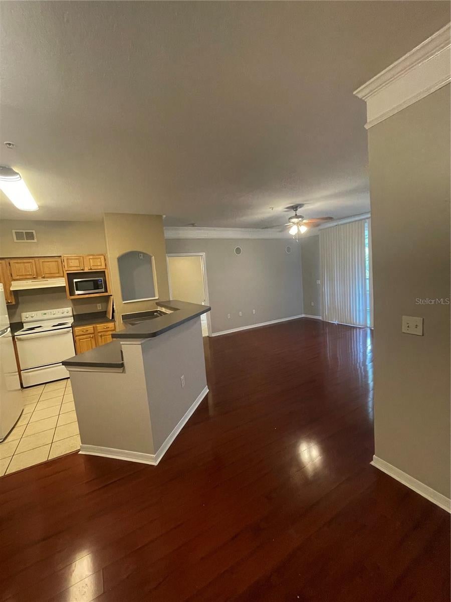 Photo of 3384 Corona Village Way #207, Orlando, FL 32835 (MLS # O6438304)