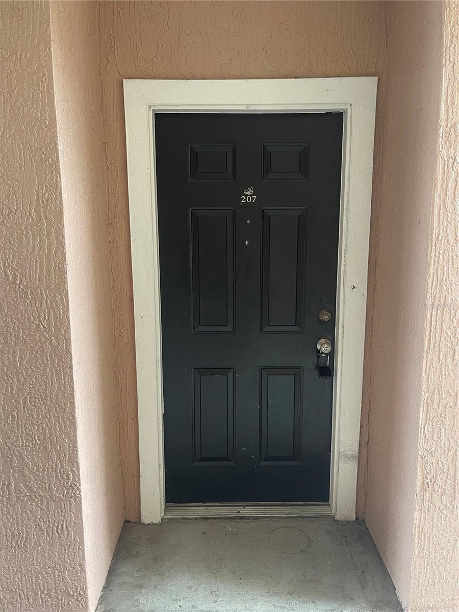 Photo of 3384 Corona Village Way #207, Orlando, FL 32835 (MLS # O6438304)