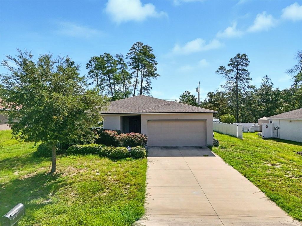 Photo of 3381 SW 129th Loop, Ocala, FL 34473 (MLS # O6315526)