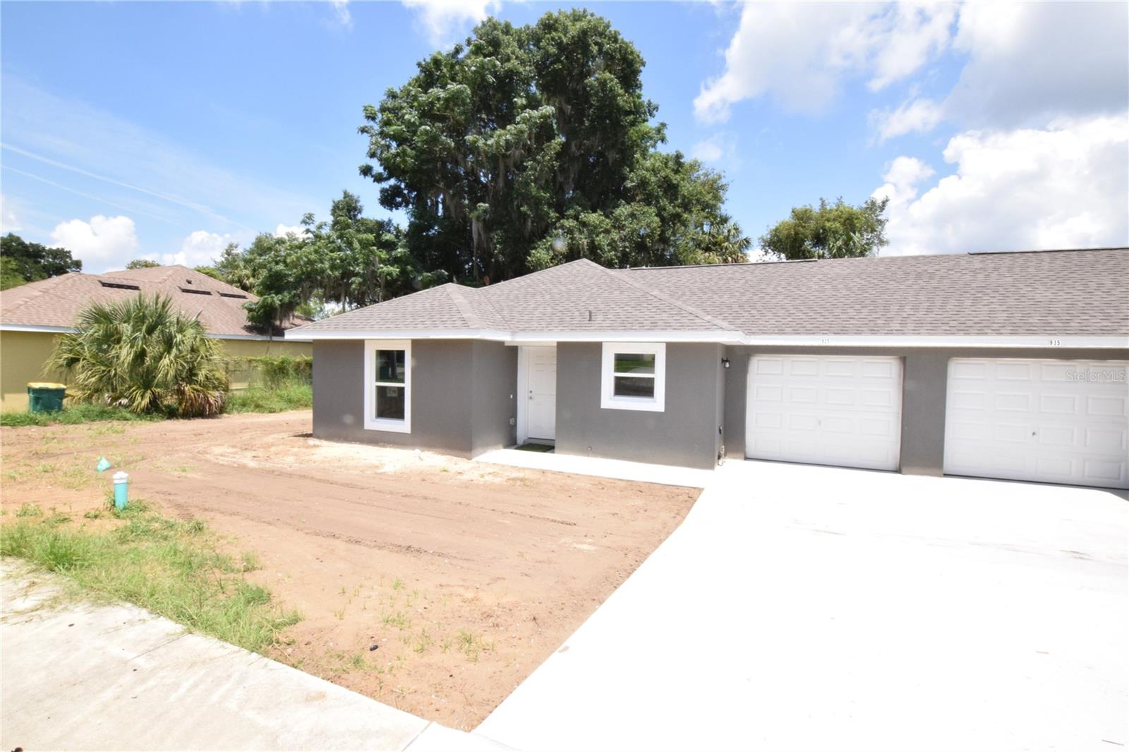 2 Bedroom, 2 Bath Duplex w/1 Car Garage For Rent in Eustis, Fl. 32726; Range, Refrigerator, D/W, Disposal, Central Heat and A/C.