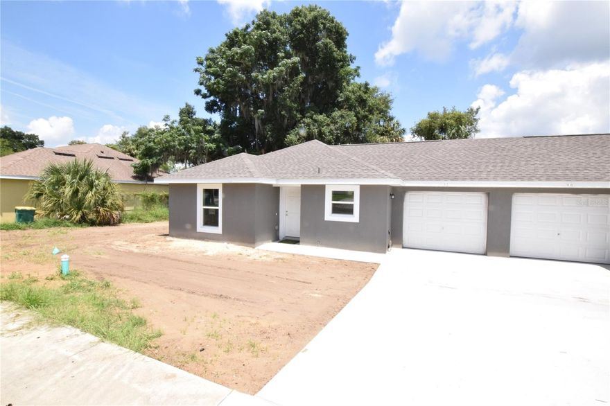 2 Bedroom, 2 Bath Duplex w/1 Car Garage For Rent in Eustis, Fl. 32726; Range, Refrigerator, D/W, Disposal, Central Heat and A/C.