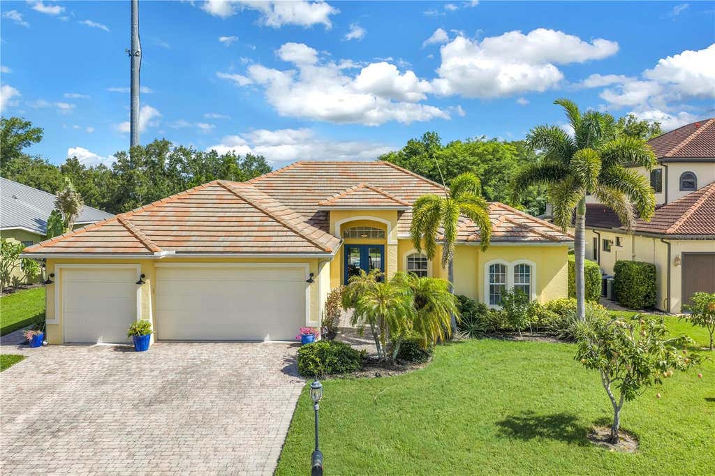 Photo of 5321 Silver Leaf Lane, Sarasota, FL 34233 (MLS # A4703299)