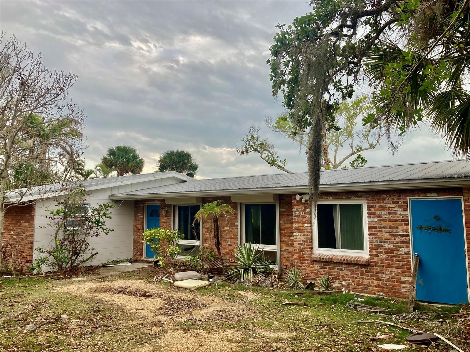 Beautiful secluded property on the 1 mile Heron Lagoon. Quiet, private oasis on the sought after south end of Siesta Key. Take in the peaceful natural surroundings from your own waterfront setting. View eagles, hawks, osprey and other Florida wildlife from your private dock. Kayak right outside your back door! No HOA no CDD. Rare opportunity to claim this space! No view of other houses! Only 1 mile from shops, restaurants, and the powdery quartz beaches of Siesta Key! Minutes to Turtle Beach
This property has been affected by Hurricane Helene with interior water damage. Ready for remodeling or build a new dream home on this amazing piece of paradise.