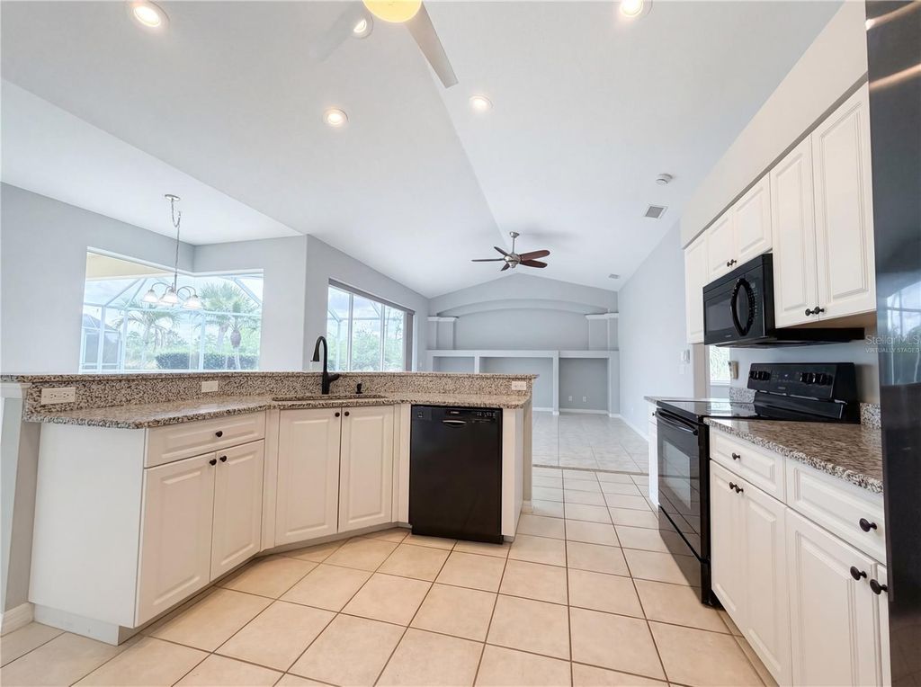 Photo of 12567 SW Pembroke Circle N, Lake Suzy, FL 34269 (MLS # O6396657)