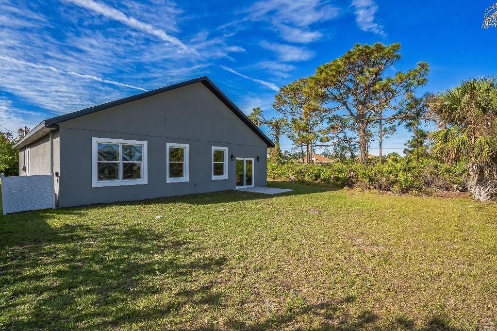 Photo of 122 Jennifer Drive, Rotonda West, FL 33947 (MLS # TB8360697)