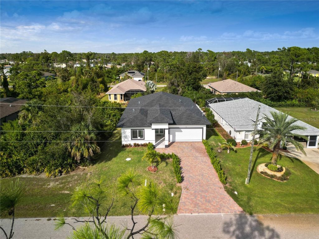 Photo of 118 Green Pine Park, Rotonda West, FL 33947 (MLS # D6144139)