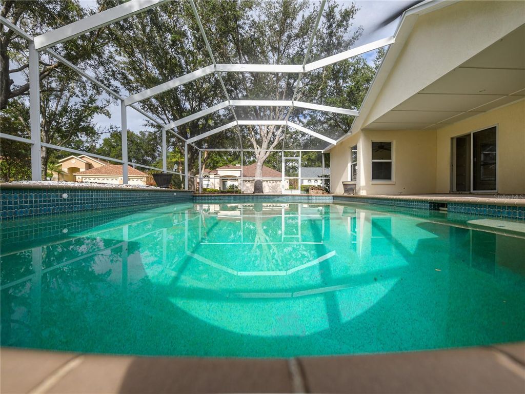 Photo of 10117 Whisper Pointe Drive, Tampa, FL 33647 (MLS # TB8429336)