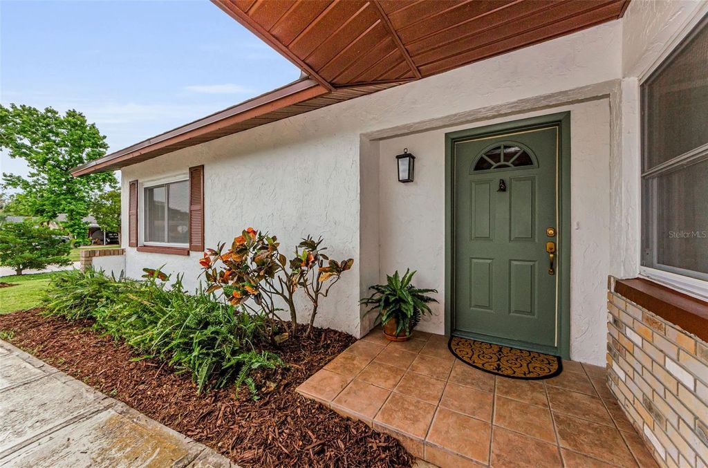 Photo of 1558 Cottonwood Terrace, Dunedin, FL 34698 (MLS # TB8393587)