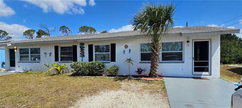 Photo of 12048 Henley Avenue #A & B, Port Charlotte, FL 33981 (MLS # A4646318)