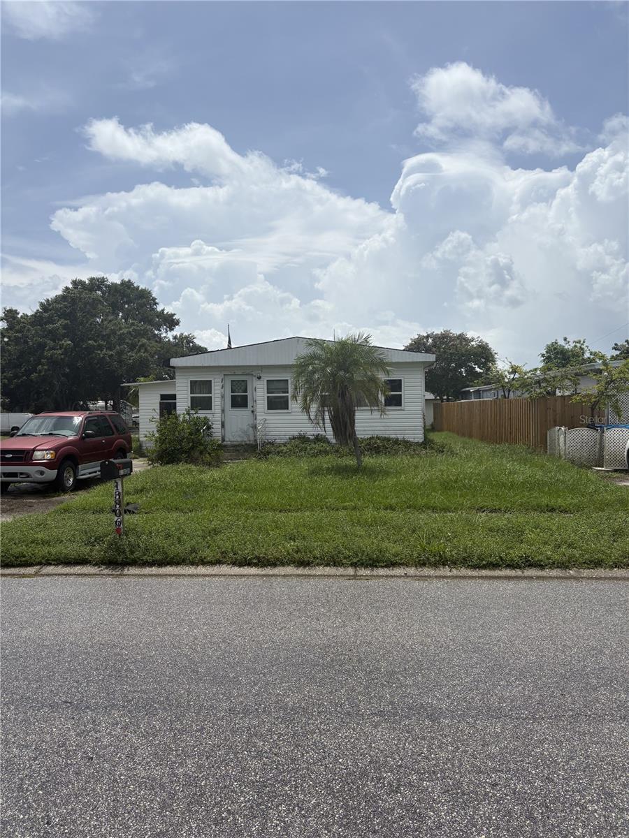 LAND VALUE ONLY. This manufactured home, situated on its own land in the heart of Clearwater, is being sold As-Is for the seller's convenience. Located in a desirable neighborhood with no age restrictions, this property offers a fantastic opportunity for those looking to personalize their space. The property is already equipped with sewer, water, and electric hookups, making it easy to begin your next project.