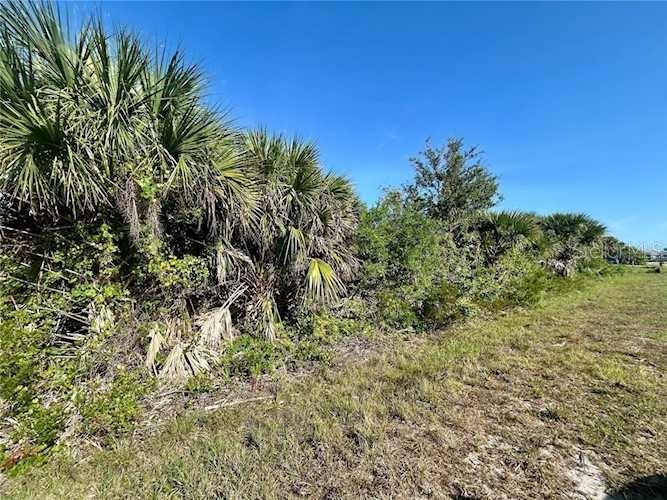 Welcome to South Gulf Cove—one of Southwest Florida’s most sought-after waterfront communities! This beautifully situated vacant lot offers the perfect opportunity to build your dream home or invest in future growth. Nestled in a quiet, well-maintained neighborhood with access to city water and sewer, this lot is ideally located near the community’s boat ramp, parks, and scenic canals.
South Gulf Cove is a boater’s paradise, with access to Charlotte Harbor and the Gulf of Mexico via a system of navigable waterways and a community lock. Enjoy the peaceful, coastal lifestyle with nearby beaches, world-class fishing, golf courses, and the charming towns of Port Charlotte, Englewood, and Boca Grande just a short drive away.
Whether you’re looking to build now or invest for the future, this lot offers excellent value in a fast-growing, deed-restricted community with low voluntary HOA fees. Don’t miss your chance to secure a piece of paradise!