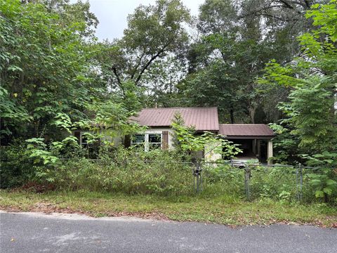 Photo of 720 NW 34th Avenue, Gainesville, FL 32609 (MLS # V4945145)