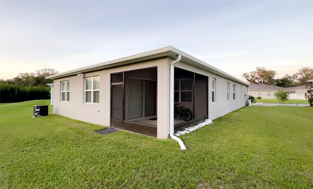 Photo of 5306 Meadow Song Drive, Okahumpka, FL 34762 (MLS # S5153706)