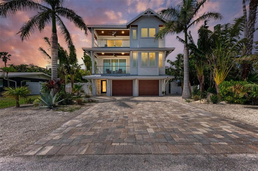 Don’t miss this stunning coastal-contemporary home on Anna Maria Island. Three new AC units installed in February 2025! Constructed to the highest quality and FEMA safety standards, this island oasis features high ceilings, an elevator, high-end finishes, an open-concept kitchen/dining/ living area, and modern coastal furniture (included). The five-bedroom home sleeps twelve, including two master suites with en-suite bathrooms, five luxurious bathrooms, four balconies, and a beautiful heated pool and spa. The spacious rooftop deck, which was recently re-tiled in its entirety, is accessible with a straight staircase (no spirals). It’s the perfect vantage point for experiencing both Anna Maria Island’s spectacular sunrises and sunsets. Meticulously maintained by its owner, this island gem sits on a quiet street ideally located between both island bridges. For added convenience, it’s just minutes from some of the island’s most popular restaurants and shopping. Best of all, it’s only a short three minute stroll to Anna Maria Island’s world famous beaches. This island retreat comfortably accommodates larger groups with a separate living room on all three levels, an outdoor dining room, an oversized pool, and an attached bathroom for every bedroom. The home has undergone numerous upgrades including new appliances (refrigerator, dishwasher and induction cooktop), electric pool heater, king sized mattresses, indoor and outdoor furniture, and exterior ceiling fans…just to name a few! With its prime location, exceptional maintenance, abundance of amenities and contemporary island feel, it’s no surprise “Coastal Breeze” is a lucrative investment property. Grossing just under $320k in bookings in 2022, and almost $300k in 2023 (despite undergoing maintenance for 5 weeks), this island home remains a favorite amongst vacationing families who return year after year. PLEASE VIEW OUR VIRTUAL TOUR VIDEO. Make an appointment for your private showing today.