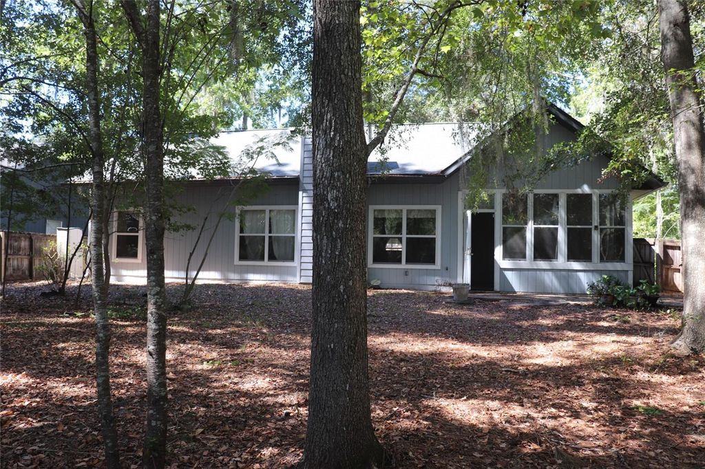 Photo of 1143 NW 98th Terrace, Gainesville, FL 32606 (MLS # OM710621)