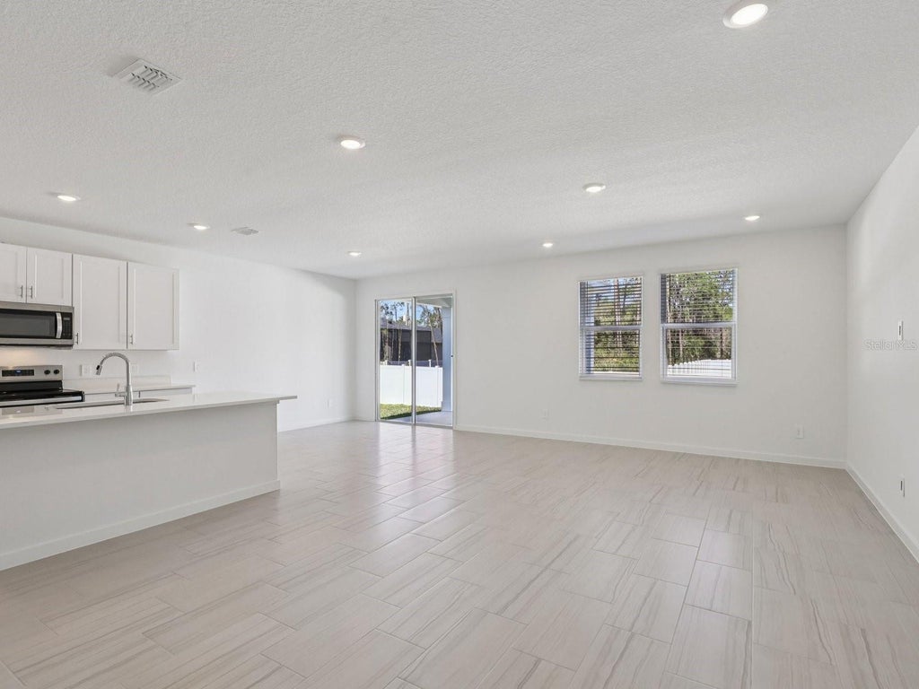 Photo of 33 Garni Drive, Palm Coast, FL 32137 (MLS # TB8554952)