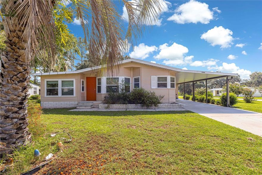 Welcome home, this manufacture home has been well taken care of, and it shows, this house has also been recently painted on the outside. This is where value and quality meet in this carefully maintained 2-bedroom, 2-bathroom retreat, complete with land ownership you own .28 of an acres! There are also two separate sheds behind the property for extra storage space. Perfect for year-round living or a winter getaway, this property has it all. This home has been well-maintained—The roof is 2022, The HVAC is 2019, The water heater is a 2024, The Septic tank was cleaned/ pumped out in 2022. 13 Windows were replaced/ upgraded with new ones in 2013. A generator with a propane tank also added in 2019 in case backup power is needed. As you drive up, you'll be greeted by an oversized carport, in this lovely corner lot leading you to a spacious shed and you can enter home through here or the front door. This home is being offered turn-key meaning furniture and dishes, utensils, appliances, bed dressings, window treatments and more will be staying with the home... The Collectible tractors and toys you see in pictures do not convey, and personal items do not convey. The Ac Wall units you see are not guaranteed to work the owner does not use them. The HVAC works great! You have two cozy FL rooms, one is being used as a den, and the other is being used as a third little bedroom for guest. These additional spaces are ideal for curling up with a book, setting up an office or savoring a refreshing iced tea while enjoying the window view! The primary suite boasts an ensuite bath with a walk-in shower. The guest bedroom has a guest bathroom right across from it. This home sits on a little over 1/4 acre, and being a corner lot, it enhances your ample space, along with the extra storage offered by the shed. With a low monthly HOA that covers trash and water services, and all the amenities including a community pool this home sits on a prime location providing easy access to travel to The Villages, Ocala, major highways, and I-75. You are just minutes away from the Marion County Flea Market and you have a Dollar General just around the corner, less than 2 miles. Don’t let this opportunity slip away! Schedule a showing today in person or virtually and discover all that this lovely home has to offer!
