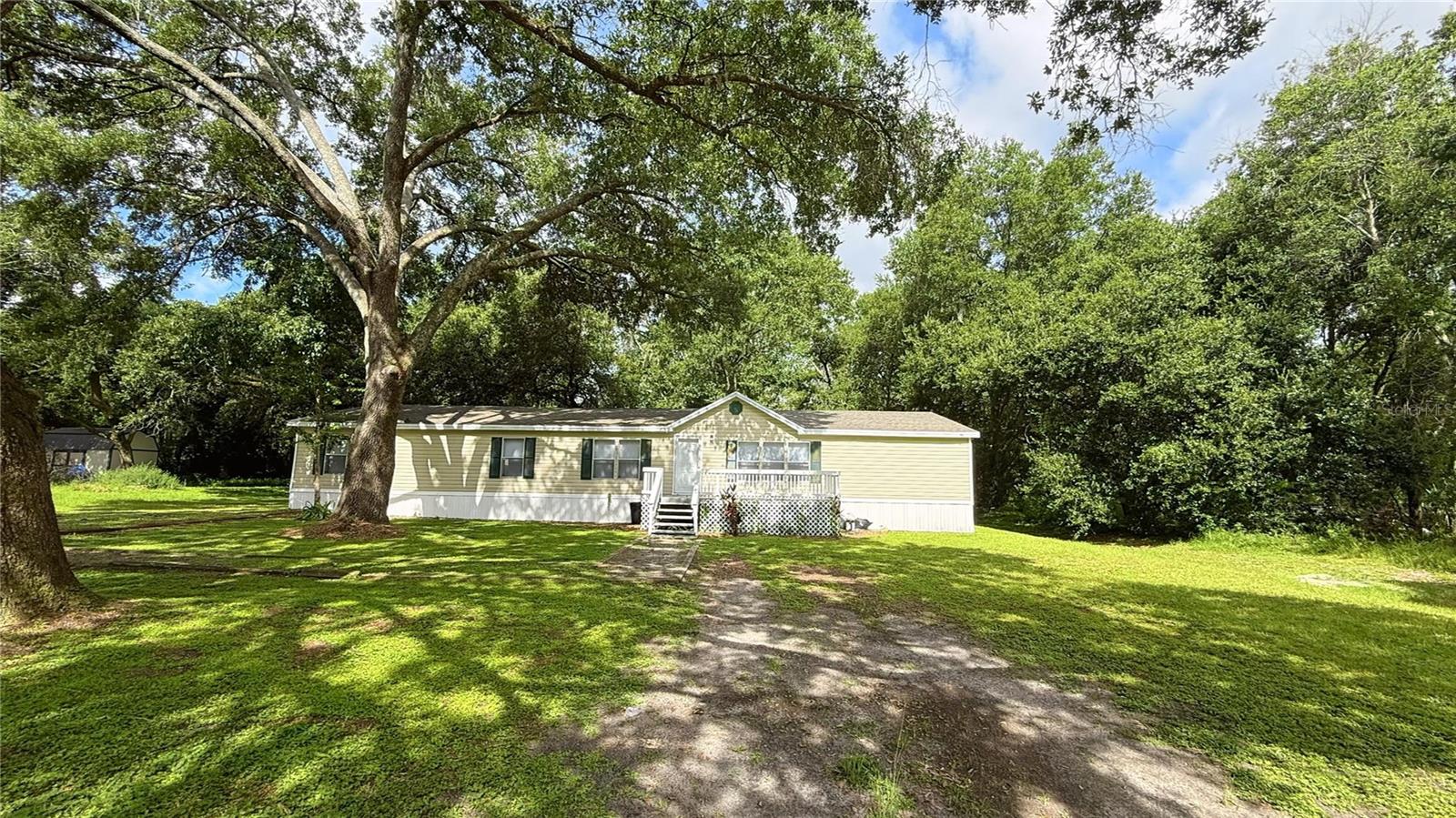 Welcome Home to this 3 bedroom/2 bath home on a spacious half-acre lot. LVP flooring throughout and freshly painted makes this one move-in ready! NEW kitchen with hard surface counters, fixtures, cabinets, lighting, and newer stainless appliances. Primary bath features double vanities, new fixtures and lighting. The walk-in shower is a bonus! Ample room for your outdoor toys, think RV, Boat, FUN FUN FUN. Love where you live!