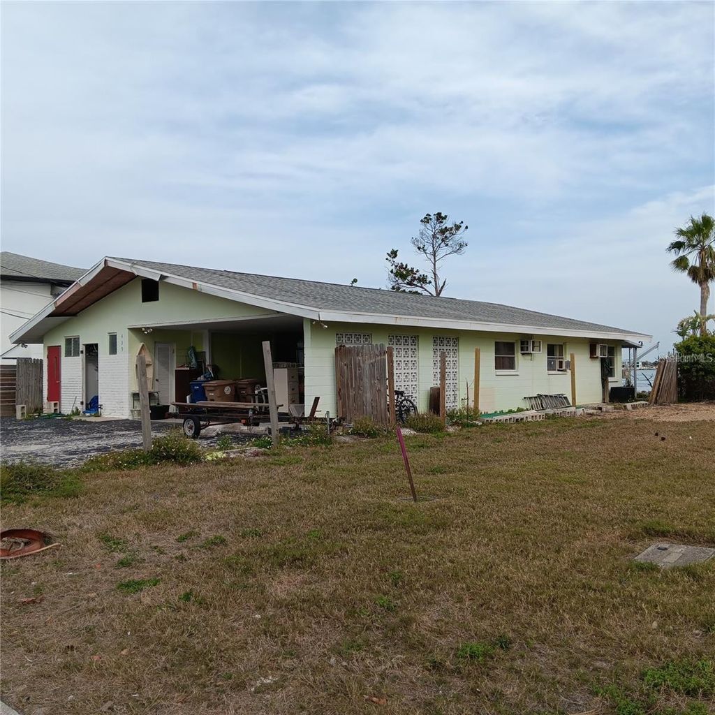 Photo of 439 129th Avenue E, Madeira Beach, FL 33708 (MLS # TB8448700)