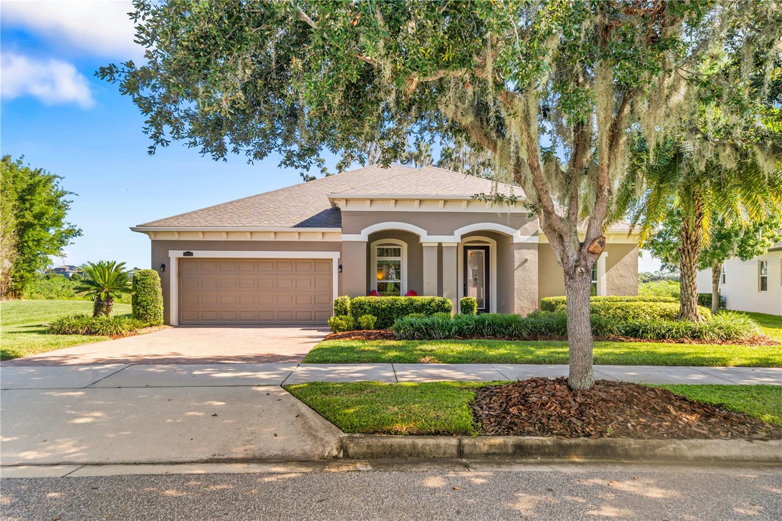 Welcome to your new home—where convenience meets peace, and every day feels a little like
vacation!
You’ll love the location. With quick and easy access to the 429, getting anywhere is simple. Just
minutes away is charming downtown Winter Garden with its restaurants, shops, 22 miles of biking
trails and Orlando’s best Saturday Farmers Market. Imagine walking or biking to nearby
schools, or heading to Disney in just 20 minutes for an evening of fireworks. Universal and downtown
Orlando are 25 minutes away, the airport just 30, and with Winter Garden Village and Advent Health
so close, life here feels effortless.
Your home is a private retreat. Sitting on a 100-foot premium conservation lot, you’ll be surrounded by
beauty every day. A 20-foot west-side easement gives you added space, live oak trees provide shade
and character, and wildlife quietly passes by. With no rear neighbors ever, your mornings begin with
unobstructed 180-degree views of two lakes and a pond. Inside, with 2,800 square feet, five
bedrooms, and 3.5 bathrooms, this home offers plenty of space and multiple rooms designed for
relaxation. The large kitchen island will be the center of gatherings with family and friends. And your
screened-in porch invites you to start your mornings with coffee and end your evenings with a glass
of wine, taking in unforgettable sunsets.
Your community feels like a resort every day. Swim in the gradual-entry pool, play tennis, pickleball,
or volleyball, or stay active in the fitness center. Walk or bike the neighborhood, enjoy the clubhouse,
or meet neighbors at the dog park. Family activities bring people together, and the low HOA makes it
even better.
This home has had only one owner, has been pet-free, and is lovingly maintained. And when you
move in, you’ll enjoy thoughtful extras that stay with the home: an outdoor garage refrigerator, a 65-
inch Samsung Frame TV, and a washer/dryer.
This is where you will find comfort and create memories that last a lifetime.