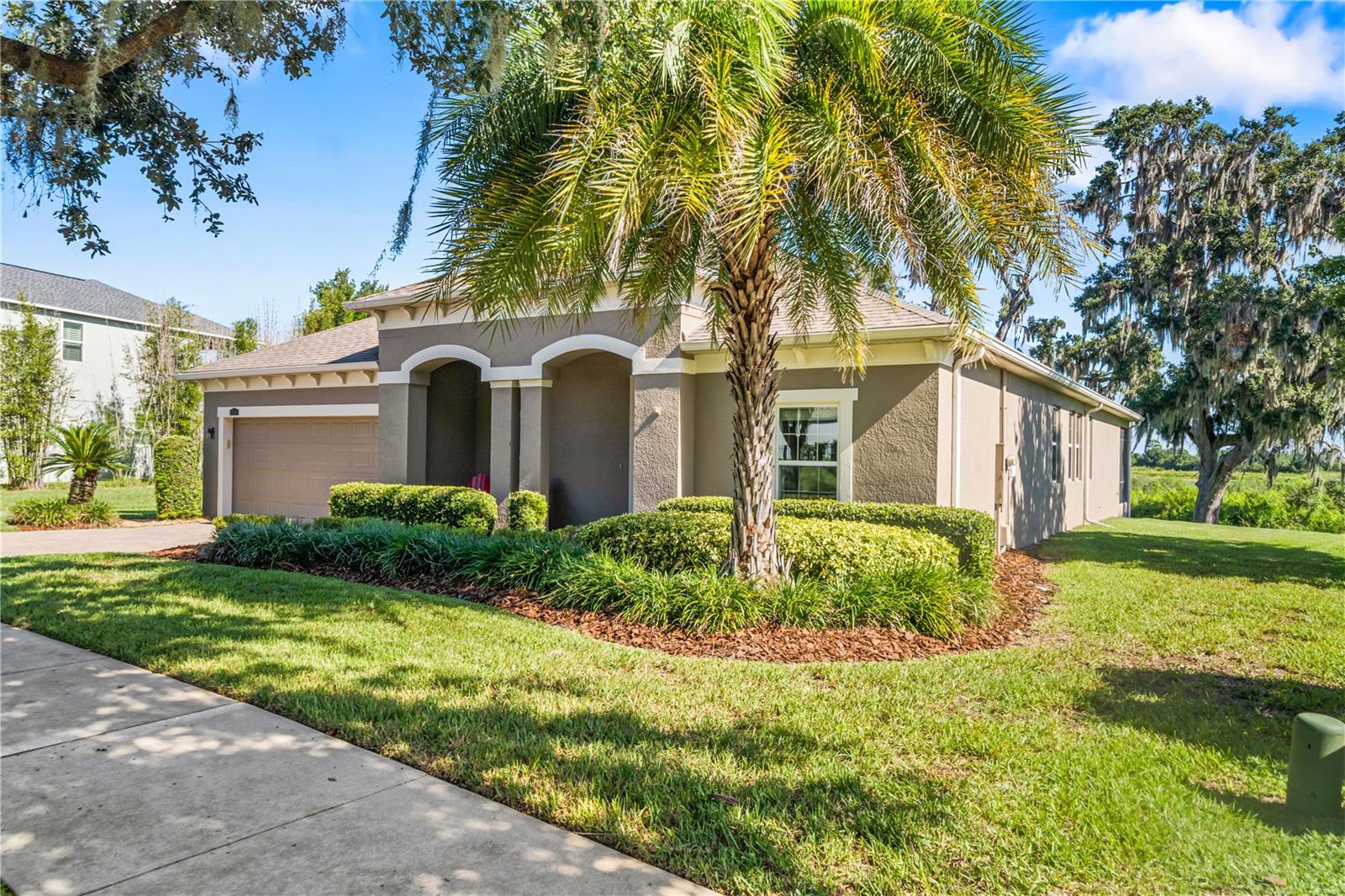 Welcome to your new home—where convenience meets peace, and every day feels a little like
vacation!
You’ll love the location. With quick and easy access to the 429, getting anywhere is simple. Just
minutes away is charming downtown Winter Garden with its restaurants, shops, 22 miles of biking
trails and Orlando’s best Saturday Farmers Market. Imagine walking or biking to nearby
schools, or heading to Disney in just 20 minutes for an evening of fireworks. Universal and downtown
Orlando are 25 minutes away, the airport just 30, and with Winter Garden Village and Advent Health
so close, life here feels effortless.
Your home is a private retreat. Sitting on a 100-foot premium conservation lot, you’ll be surrounded by
beauty every day. A 20-foot west-side easement gives you added space, live oak trees provide shade
and character, and wildlife quietly passes by. With no rear neighbors ever, your mornings begin with
unobstructed 180-degree views of two lakes and a pond. Inside, with 2,800 square feet, five
bedrooms, and 3.5 bathrooms, this home offers plenty of space and multiple rooms designed for
relaxation. The large kitchen island will be the center of gatherings with family and friends. And your
screened-in porch invites you to start your mornings with coffee and end your evenings with a glass
of wine, taking in unforgettable sunsets.
Your community feels like a resort every day. Swim in the gradual-entry pool, play tennis, pickleball,
or volleyball, or stay active in the fitness center. Walk or bike the neighborhood, enjoy the clubhouse,
or meet neighbors at the dog park. Family activities bring people together, and the low HOA makes it
even better.
This home has had only one owner, has been pet-free, and is lovingly maintained. And when you
move in, you’ll enjoy thoughtful extras that stay with the home: an outdoor garage refrigerator, a 65-
inch Samsung Frame TV, and a washer/dryer.
This is where you will find comfort and create memories that last a lifetime.