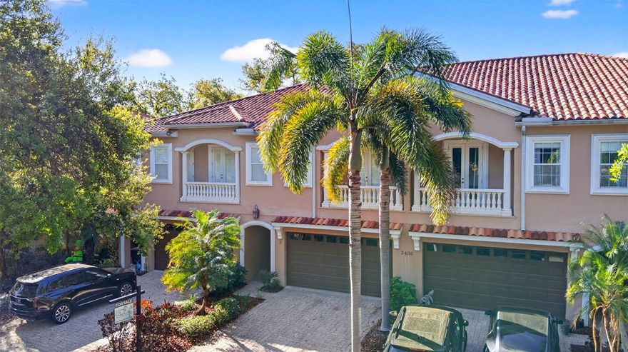 Live just blocks from iconic Bayshore Boulevard in the heart of Palma Ceia, one of South Tampa’s most desirable neighborhoods. This beautifully maintained 3-bedroom, 2.5-bath townhome with a two-car garage offers spacious living, modern upgrades, and walkable access to some of Tampa’s best restaurants, boutiques, salons, and neighborhood conveniences.
Inside, the home features wood flooring, crown molding, plantation shutters, and high ceilings, creating a bright and inviting atmosphere. The open kitchen, living, and dining area is ideal for entertaining and everyday living, complete with wood cabinetry, granite countertops, stainless steel appliances, and a large center island. The living area is enhanced with six Polk ceiling surround sound speakers for an elevated entertainment experience. Upstairs, the primary suite offers a spacious layout with a large walk-in closet and en-suite bath featuring granite countertops, garden tub, separate shower, and updated glass enclosure. Two additional bedrooms provide generous space and storage, while the versatile loft area is perfect for a home office, playroom, or fitness area. The laundry room is conveniently located on the second floor and includes washer and dryer. Recent upgrades include two new Daikin A/C systems with updated air handlers and condensers, a Halo whole-home water filtration system, and a Tesla charging station installed in the two-car garage. Additional improvements include fresh interior paint, updated bedroom carpeting, and enhanced shower glass in the primary bath.
Step outside to enjoy the private fenced backyard featuring newly installed turf and a wood deck, creating a low-maintenance outdoor space ideal for relaxing or entertaining. Ideally located near Bayshore Boulevard, Hyde Park Village, Palma Ceia Golf & Country Club, downtown Tampa, and top-rated dining and shopping, this home offers the perfect combination of location, comfort, and the South Tampa lifestyle.