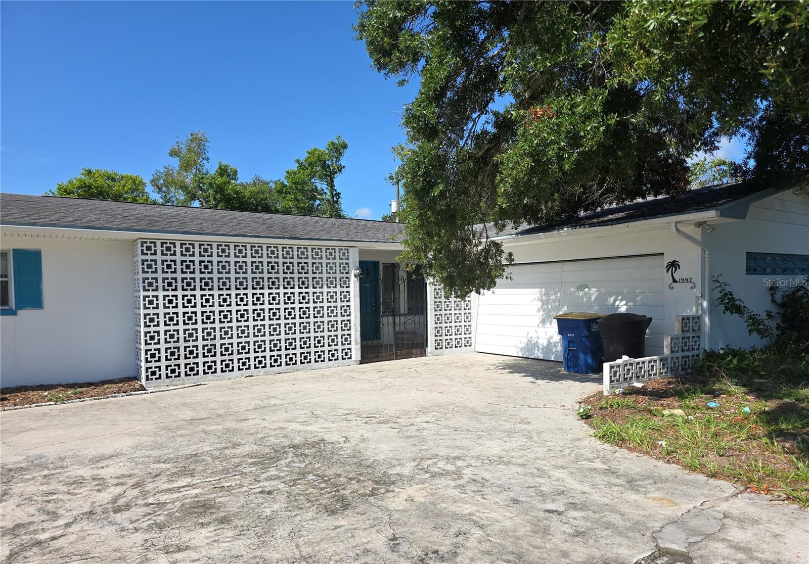 Great 3 bedroom 2.5 bath home located on corner lot in very desirable area of Clearwater. Home offers updated kitchen with new appliances, fresh interior paint and new flooring throughout. Foyer entry that leads to Large living room and separate formal dining room. Light and bright kitchen offering a dinette area. There is a seperate family room off of the dining room area with french doors leading to the rear fenced yard. Third Bedroom with fireplace can be used as a flex space if desired. Home is nested on a large corner lot with circular driveway. Enjoy easy access to shopping, beaches and parks.