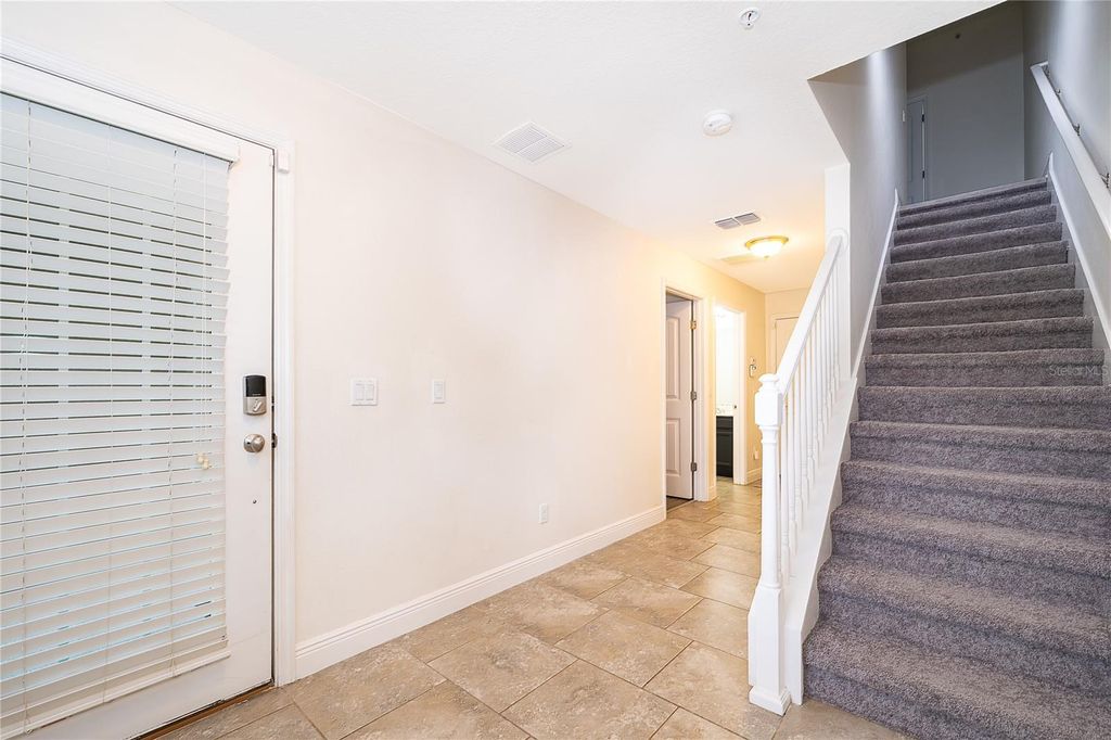 Photo of 10061 Town Lake Drive, Orlando, FL 32832 (MLS # O6413589)