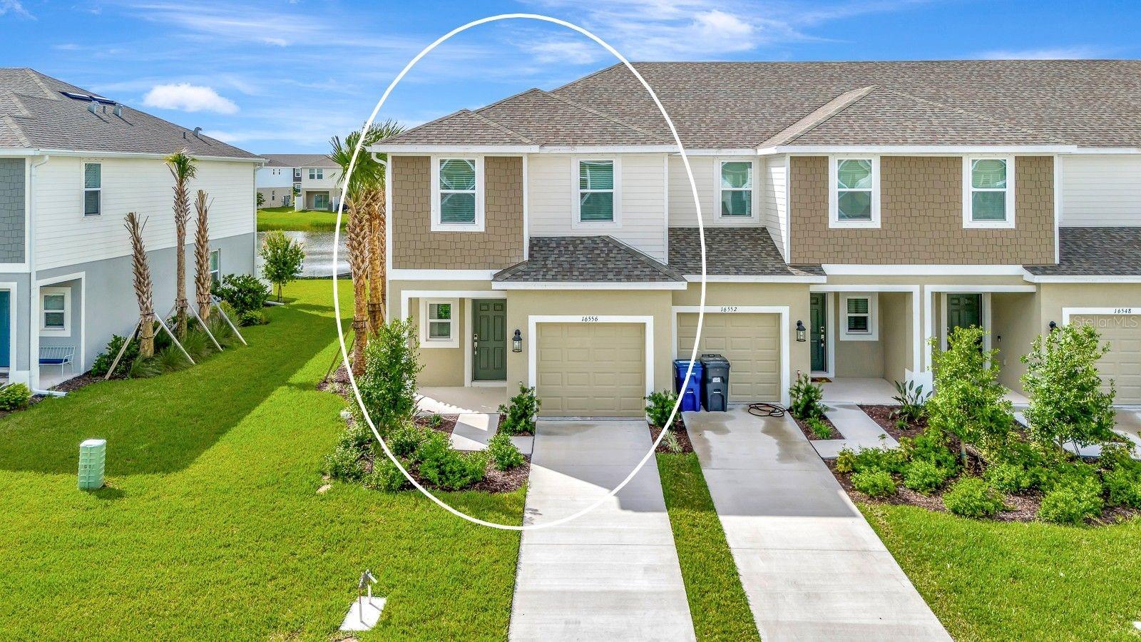 One or more photo(s) has been virtually staged. Annual rental located in the highly desirable community of Townhomes at Azario in Lakewood Ranch. As you enter this brand-new end unit, you’re welcomed by an open concept showcasing a chef’s kitchen adorned with rich cabinetry, gleaming granite countertops, and stainless-steel appliances, all overlooking the spacious living and dining areas. Step outside to the patio, where you can enjoy your morning coffee or unwind in the evening while taking in tranquil lake views. A conveniently located half bath completes the first floor. Upstairs, the thoughtfully designed split-bedroom layout ensures privacy and comfort. The primary suite offers a peaceful retreat with a large walk-in closet, dual vanities, and a walk-in shower. Two additional guest bedrooms share a beautifully appointed full bath. A laundry area with a full-size washer and dryer is also located on the upper level for added convenience. An attached one-car garage provides secure parking and additional storage. Residents will enjoy access to community amenities, including a resort-style pool with cabanas and a dog park, all within a beautifully maintained neighborhood setting. This prime location offers easy access to top-rated schools, world-class beaches, shopping and dining, University Town Center, Sarasota-Bradenton Airport, medical facilities, I-75 and much more. Available for immediate move-in upon approval. Small dog accepted with pet deposit. Some photos have been virtually staged to help you envision how this beautiful home can look once furnished. Schedule your private showing today before this one is gone! First month of rent and one month of security deposit required.