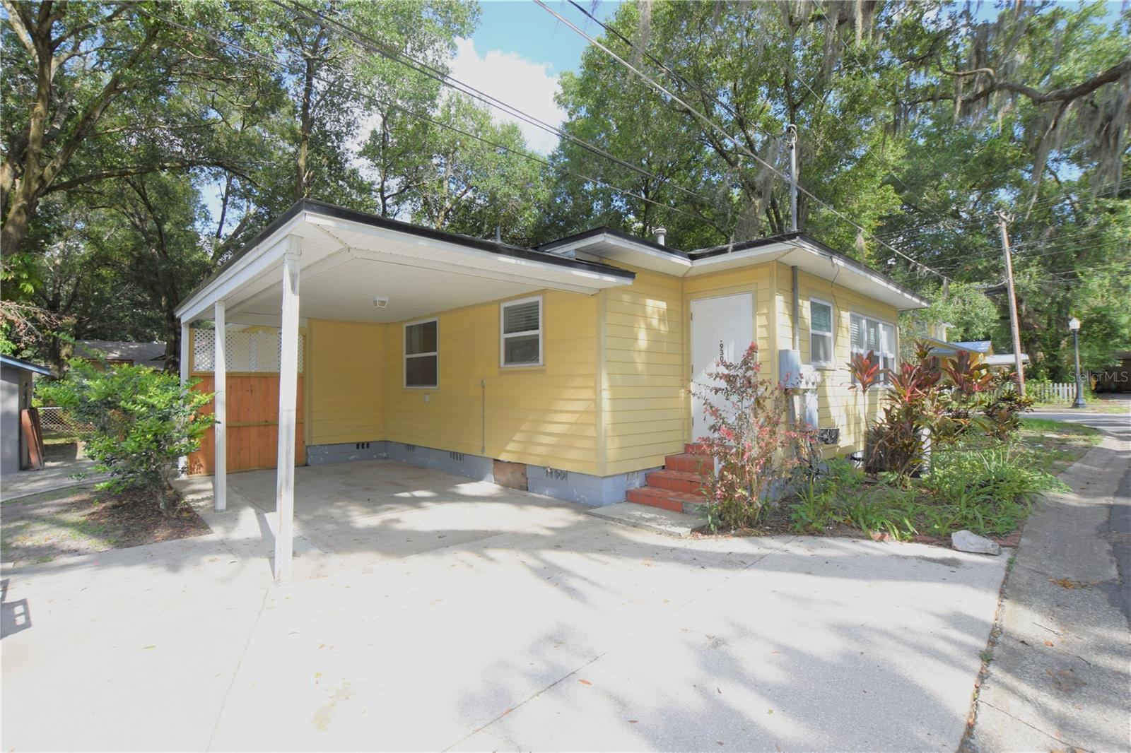 This home boasts LVP flooring throughout (No carpeting). Updated kitchen with shaker style cabinets and granite counters. Updated bathroom with vanity and Tub. This home is located within walking distance to all downtown Lakeland has to offer. The home's exterior will be painted a light grey with in 30 days. Lawn care is included. Assigned parking. Washer and dryer hook ups, New energy-efficient windows.