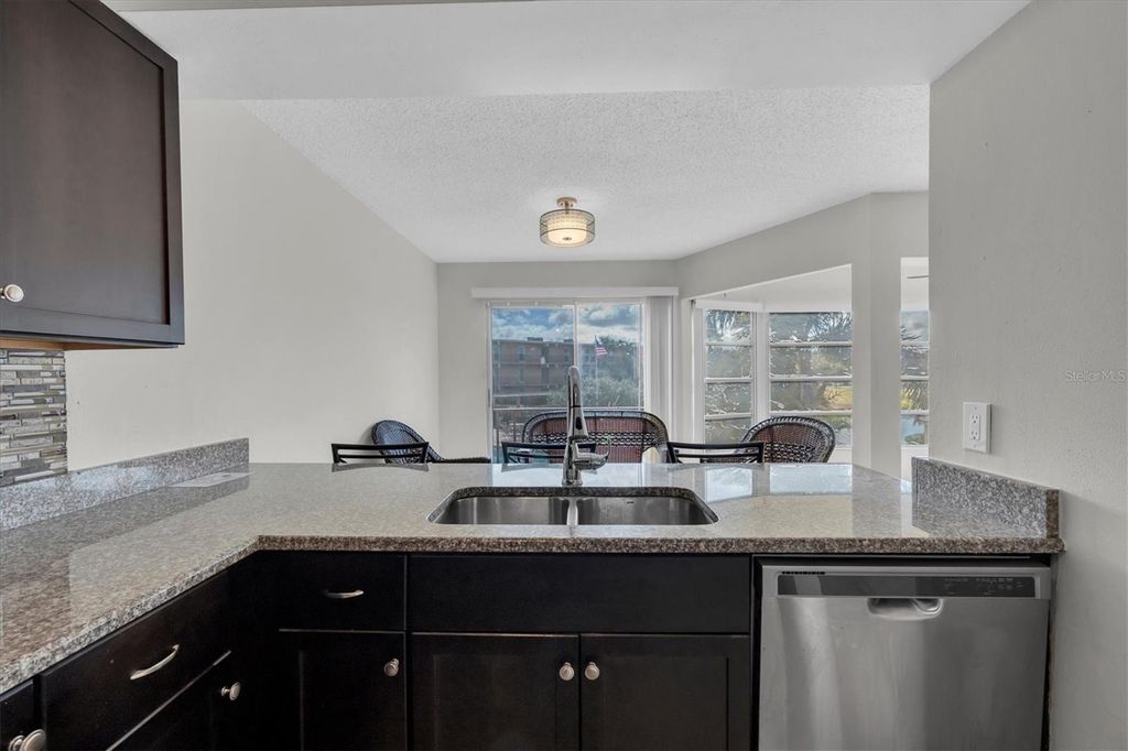 Photo of 225 Country Club Drive #A203, Largo, FL 33771 (MLS # TB8478188)