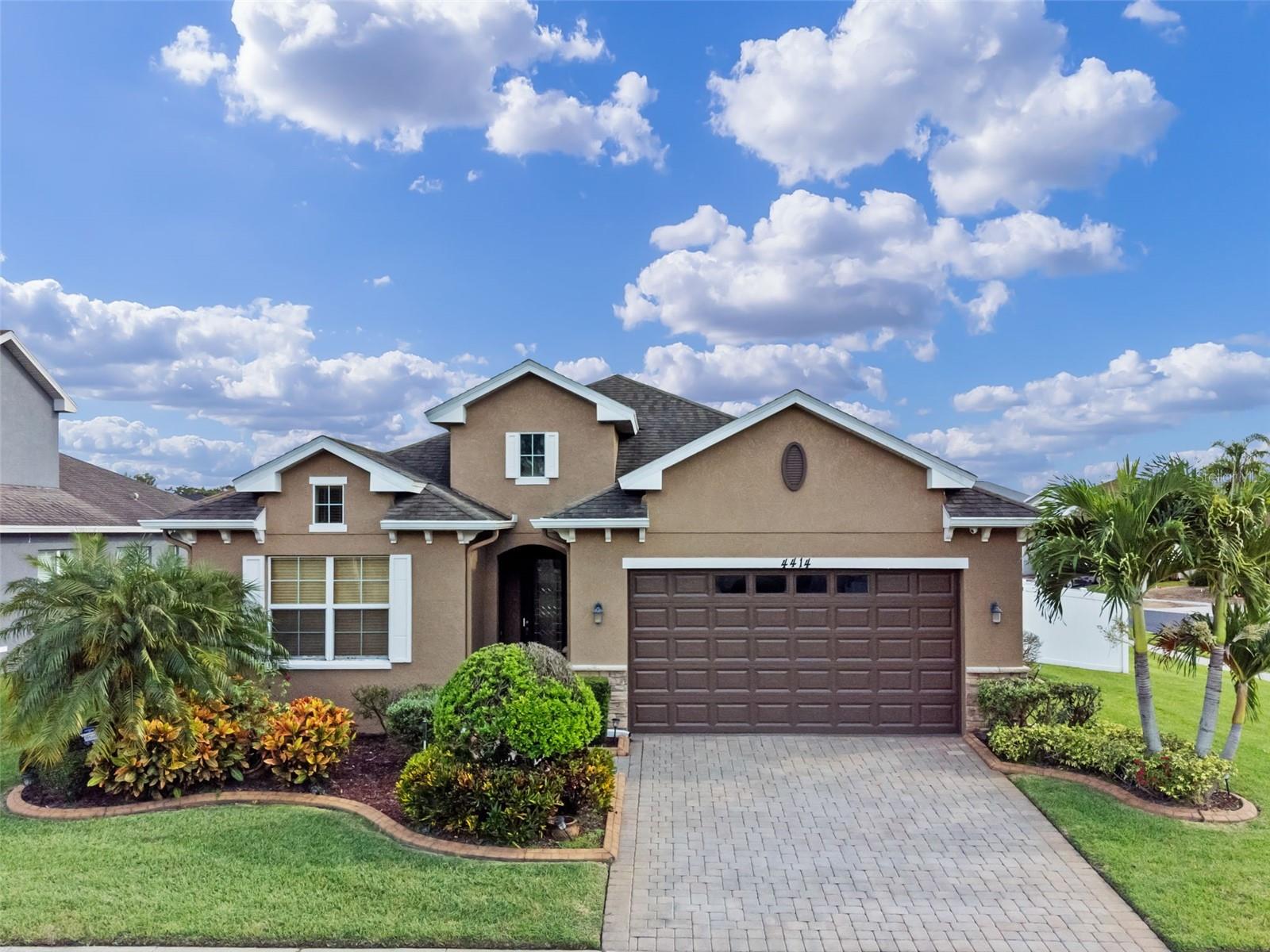 Absolutely gorgeous Florida beauty. This residence is extremely well kept. Pride of ownership oozes throughout the entire property. This lovely home is located in the gated Northpoint community. Northpoint is a quiet neighborhood situated close to major highways, Disney, Universal Studios and other major attractions and entertainment. Orlando international airport, Lake Nona Medical city and shopping are just minutes away. The home is equipped with 4 spacious bedrooms, 2 and a half baths, granite countertops, wood and ceramic tiled floors, 2-car garage and beautifully complimented with an awesome entertainment area with an outdoor bar. This residence is ideal for vacations and entertainment. It comes with 2 TVs in the master bedroom suite in addition to all appliances and window dressings. Priced for a quick sale!