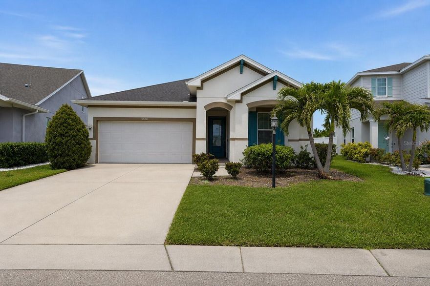 Welcome to the former David Weekley Hacienda Model Home in the gated community of Moss Creek. Designed to showcase the builder's finest craftsmanship, this exceptional residence features high-end finishes, designer details, and numerous upgrades that make it truly one of a kind. The open-concept floor plan offers a bright, airy feel with elegant tray ceilings, quartz countertops, bright shaker cabinetry, automatic window treatments, and thoughtfully curated finishes throughout.

The outdoor living space is equally impressive, featuring an extended paver lanai that serves as a seamless extension of the home—perfect for relaxing or entertaining year-round. The private splash pool can also be enjoyed as a spa/jacuzzi, creating your own backyard retreat.

Beyond its luxury features, this home offers significant value with a low HOA fee and no CDD fees, helping keep ongoing ownership costs lower than many comparable communities in the area. Combining model-home quality, premium upgrades, and long-term savings, this property represents an exceptional opportunity.

Ideally located with convenient access to I-75, Lakewood Ranch, Sarasota, shopping, dining, and Gulf Coast beaches. Furnishings and décor are negotiable, offering the potential for a truly turnkey experience.