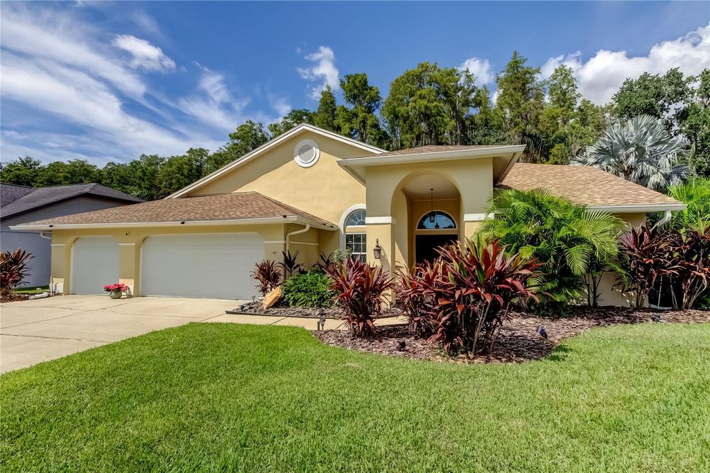 Photo of 965 Cobblestone Lane, Tarpon Springs, FL 34688 (MLS # TB8427969)