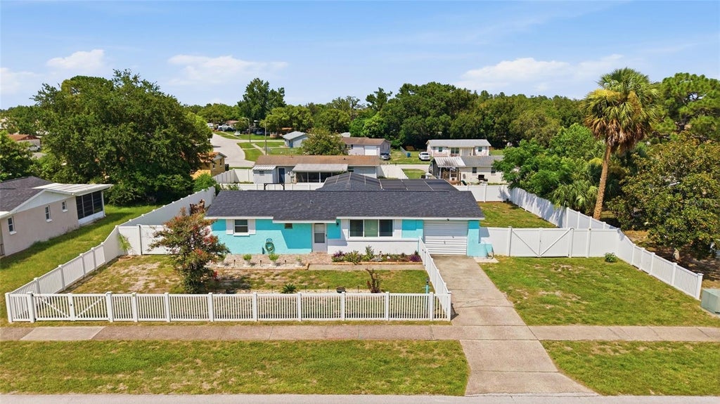 Photo of 9347 Miracle Drive, Spring Hill, FL 34608 (MLS # TB8533424)