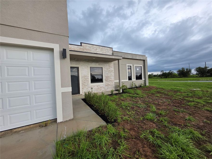 Brand-new 2024 construction available for immediate occupancy in NW Cape Coral. This 3-bedroom, 2-bathroom home features an open floorplan with a modern kitchen equipped with stainless steel appliances.  The primary suite offers a step-in shower. Additional features indoor laundry room and attached garage. Move-in incentive available: First month free. Security deposit equals one month’s rent. Conveniently located near schools, shopping, and major roadways. "Photos are of a similar model and are for reference only. Actual finishes, colors, and features may vary"