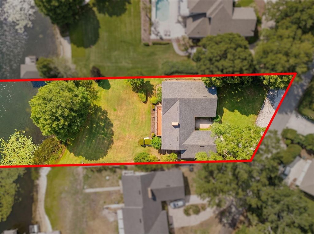 Photo of 517 Derry Down Road, Orlando, FL 32806 (MLS # O6407088)