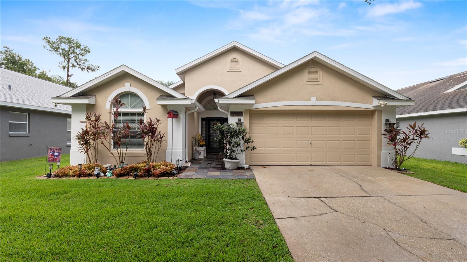 Located in the heart of Fishhawk Ranch, this charming 3-bedroom, 2-bath home is priced to sell and the seller is motivated! Tucked away on a quiet street in one of Lithia’s most desirable communities, this home offers a blend of comfort, space, and access to top-rated schools and resort-style amenities. Notable upgrades include a new roof installed in 2020, Roof has been sealed; offering a transferable 3-year warranty—providing peace of mind for years to come. Step outside to your private backyard retreat featuring vinyl fencing (2017) for added privacy, a screened-in lanai (2024) for year-round enjoyment, and pavered patio space ideal for entertaining or relaxing under the Florida sun. Surrounded by lush nature yet conveniently close to it all, this home is just minutes from local restaurants, shopping, and only an 8-minute drive to Lithia Springs Park. With easy access to I-75, I-4, I-275, and the Selmon Expressway, commuting to Tampa, Brandon, and Riverview is a breeze. You’re also just 30 minutes from Plant City, Lakeland, Apollo Beach, Ruskin, Temple Terrace, and Downtown Tampa, and within an hour of iconic Gulf Coast beaches like St. Pete Beach, Fort De Soto, Treasure Island, Madeira Beach, and Clearwater Beach. Whether you're a first-time buyer or looking to move into Fishhawk Ranch at an unbeatable value, this home is a rare opportunity. Don’t wait—schedule your private showing today before it’s gone!