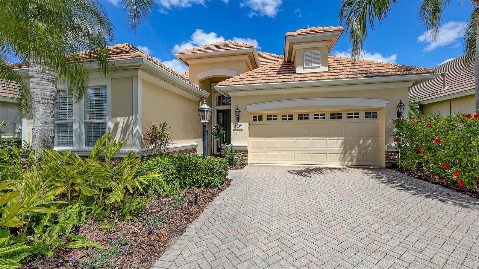 Discover effortless Florida living in this beautifully maintained maintenance-free home located in the sought-after Country Club of Lakewood Ranch. Enjoy serene water views from your expanded lanai, perfect for relaxing or entertaining.
This charming 2-bedroom + den/office home showcases a desirable great room floor plan with light neutral tones, tile flooring throughout the living areas, and engineered wood in the bedrooms. The chef’s kitchen boasts staggered cabinetry, silestone countertops, and a cozy breakfast nook with sliding doors that bathe the space in natural light. A separate formal dining room adds an elegant touch, while the spacious living area features two sets of sliders leading to the lanai for seamless indoor-outdoor living.
Retreat to the primary suite, a private oasis with two custom walk-in closets, tray ceiling, and a relaxing sitting area. The spa-like primary bath includes dual vanities, a garden tub, and a walk-in shower.
Recent updates include fresh interior paint, stylish upgraded light fixtures and fans, modern cabinetry hardware, plantation shutters and shades, hurricane shutters on front and side windows, electric hurricane shutter on front door, and enhanced landscaping. The Orchid Island neighborhood offers lawn care, a community pool, and low-maintenance fees for stress-free living.
Lakewood Ranch is a premier master-planned community featuring a private Country Club, four championship golf courses, 18 lighted tennis courts, a top-tier athletic center, a polo club, scenic parks, and walking trails. Plus, you're just minutes from Waterside Place, Lakewood Ranch Main Street, University Town Center, and world-class Gulf Coast beaches.
Experience the best of Florida living—schedule your private showing today!