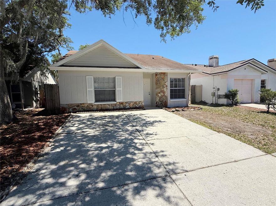 One or more photo(s) has been virtually staged. Welcome to Plant City's Country Hills Community! This 1988 built home offers 1230 square feet, 3 bedrooms, 2 bathrooms and fenced backyard with shed. Step inside to this traditional Florida style home into the kitchen and eat in area. Kitchen includes ample counter and cabinet space with bar height seating overlooking the family room. Sliding doors from the family room lead out to the screened patio and fenced backyard. Primary suite is directly off the family room and includes walk in closet, vanity and shower/tub combination. Secondary bedrooms are situated on the other side of the home sharing a full bathroom. *Roof in process of being replaced. Great central location, close to shopping, restaurants and the interstate.