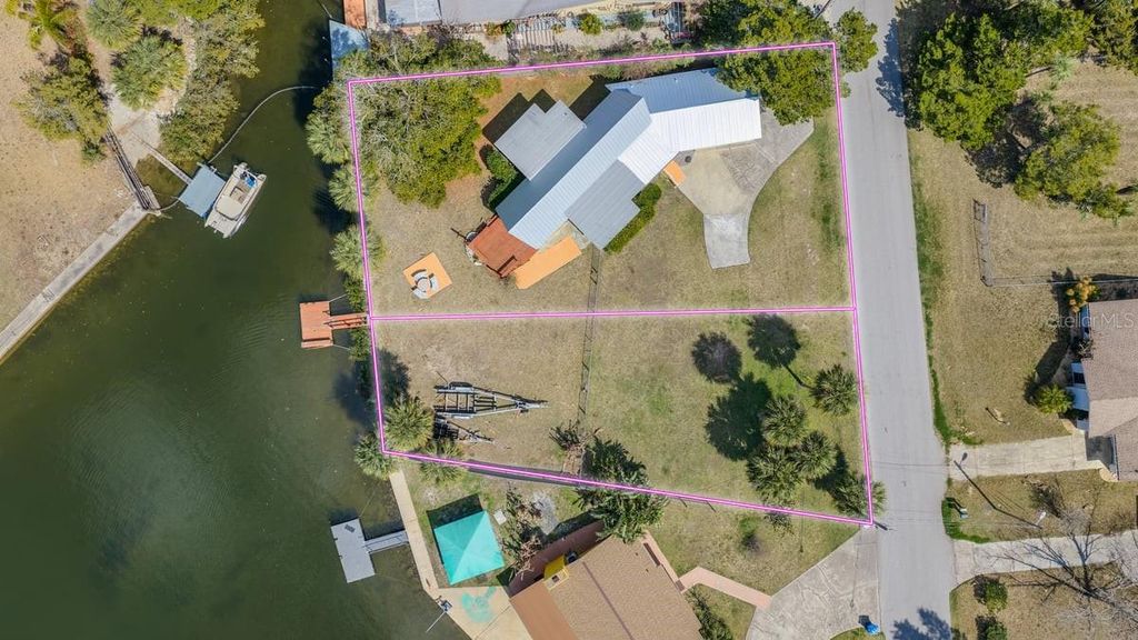 Photo of 3427 Minnow Creek Drive, Hernando Beach, FL 34607 (MLS # TB8481699)