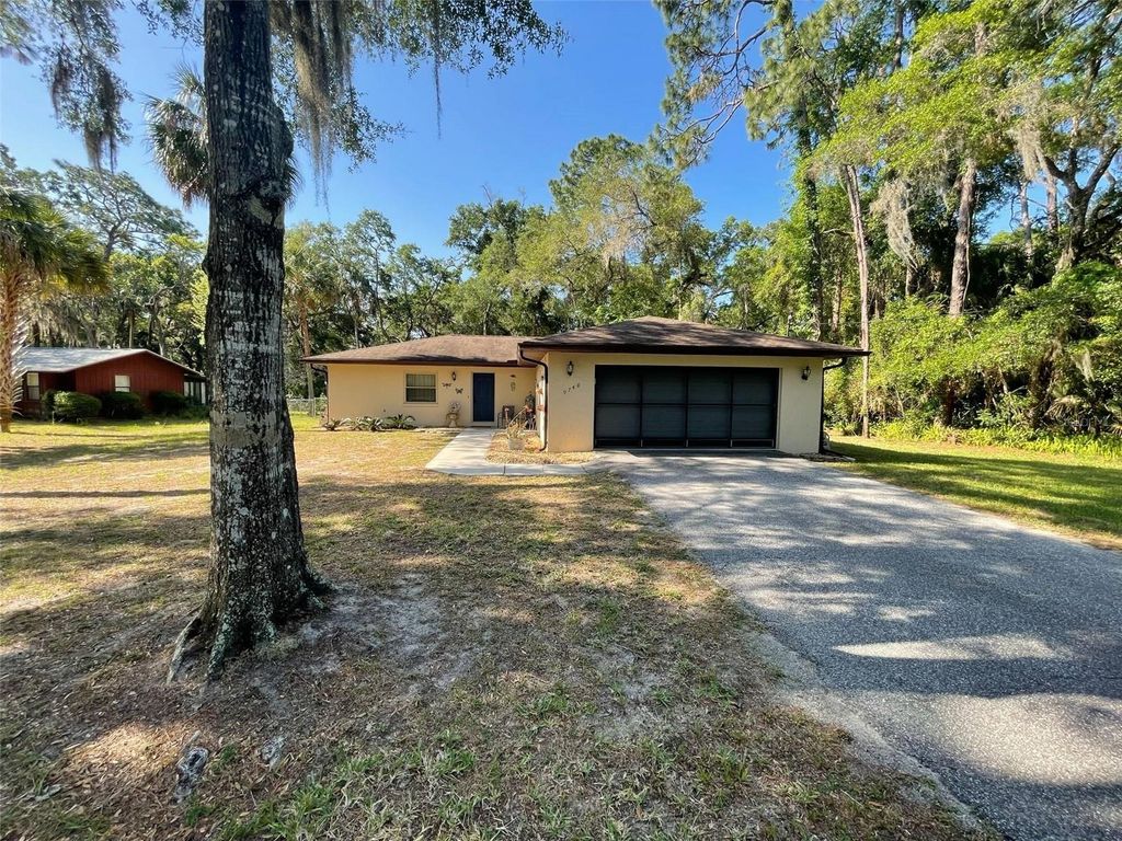 Photo of 9740 W Cranberry Street, Crystal River, FL 34428 (MLS # OM702000)