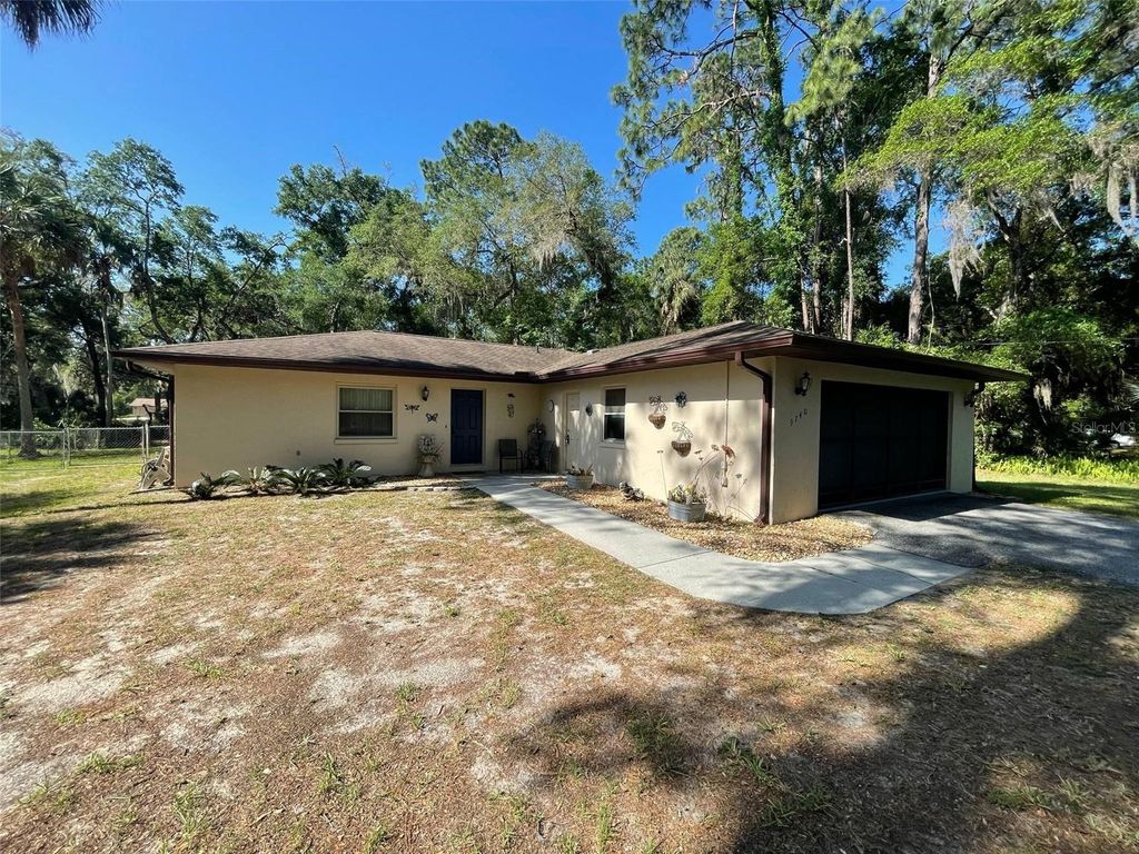 Photo of 9740 W Cranberry Street, Crystal River, FL 34428 (MLS # OM702000)